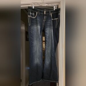 Maurices Bootcut Jeans with Rhinestone pockets.